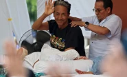 sonam wangchuk an indian education reformer who has been on hunger strike gestures as he recieves a back massage during a sit in protest called by cockroach janta party cjp demanding the resignation of indian education minister dharmendra pradhan at jantar mantar in new delhi india photo reuters