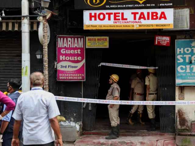 firefighters stand at an entryway to a hotel where a fire broke out and killed several people in kolkata india photo reuters firefighters stand at an entryway to a hotel where a fire broke out and killed several people in kolkata india photo reuters