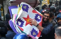 a large number of people selecting and purchasing the kites to celebrate the upcoming three day kite flying festival basant at local market in the provincial capital photo app