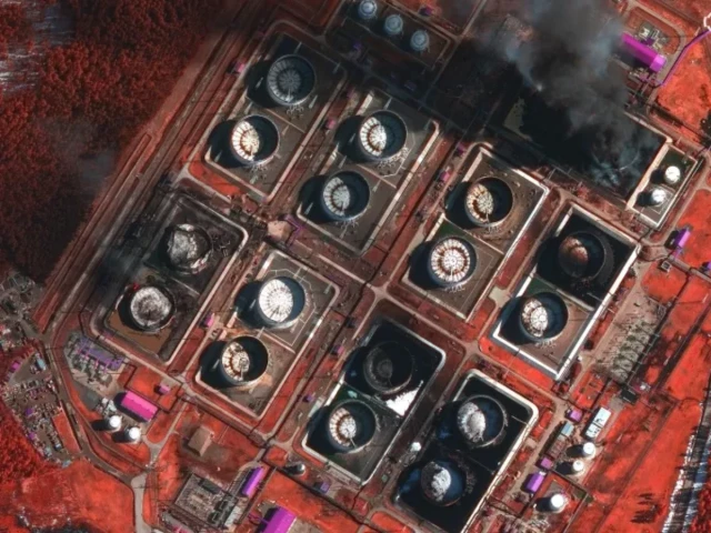 a satellite near infrared image shows smoke rising from damaged oil storage tanks as they burn after a ukrainian attack in primorsk russia photo reuters a satellite near infrared image shows smoke rising from damaged oil storage tanks as they burn after a ukrainian attack in primorsk russia photo reuters