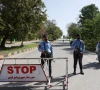 police officers stand at a check post on a road leading to the serena hotel as pakistan prepares to host the us and iran for peace talks in islamabad photo reuters