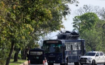 3 killed 20 injured in bus police van crash