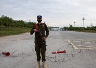 a police officer stands guard near the president s house as delegations from the us and iran are expected to hold peace talks in islamabad on april 11 2026 photo reuters