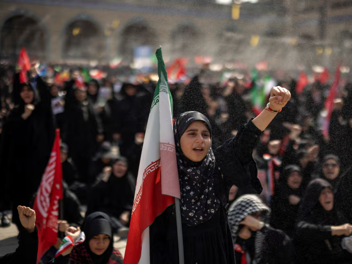 A girl shouts slogans during a public farewell ceremony for late supreme leader Ayatollah Ali Khamenei at the Imam Khomeini Grand Mosalla, in Tehran, Iran. Photo: Reuters