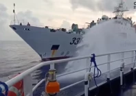 a chinese coast guard ship fires a water cannon at a philippine vessel in this screengrab taken from a handout video released on july 23 2026 location given as south china sea photo reuters