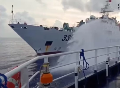 philippines says ship hit by chinese water cannon at disputed reef philippines says ship hit by chinese water cannon at disputed reef