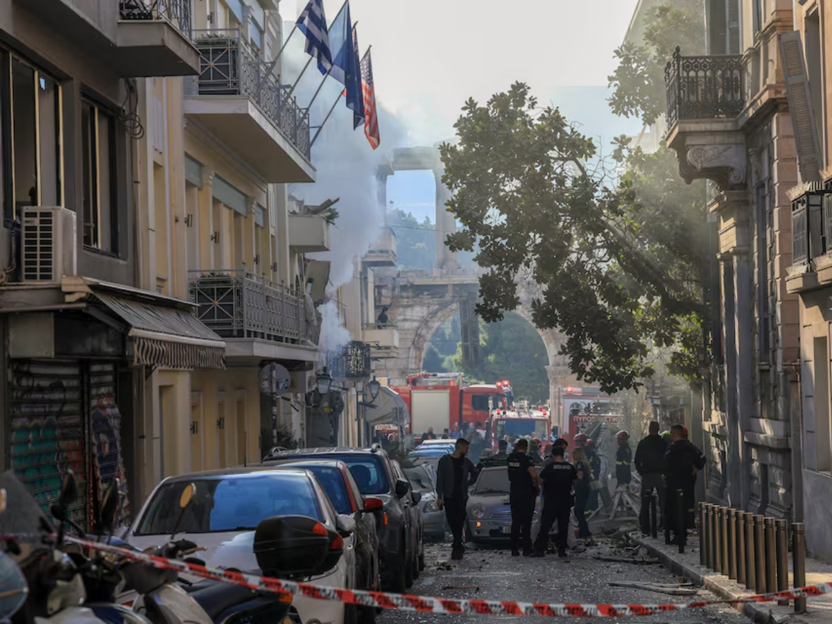 Emergency personnel work at the site where an old building partially collapsed following an explosion, at the touristy Plaka area in central Athens, Greece. Photo: Reuters
