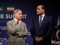 prime minister shehbaz sharif stands with chief of army staff field marshal asim munir prior to a quadrilateral meeting between the united states iran pakistan and qatar at the burgenstock luxury hotel complex overlooking lake lucerne switzerland on june 21 2026 photo reuters