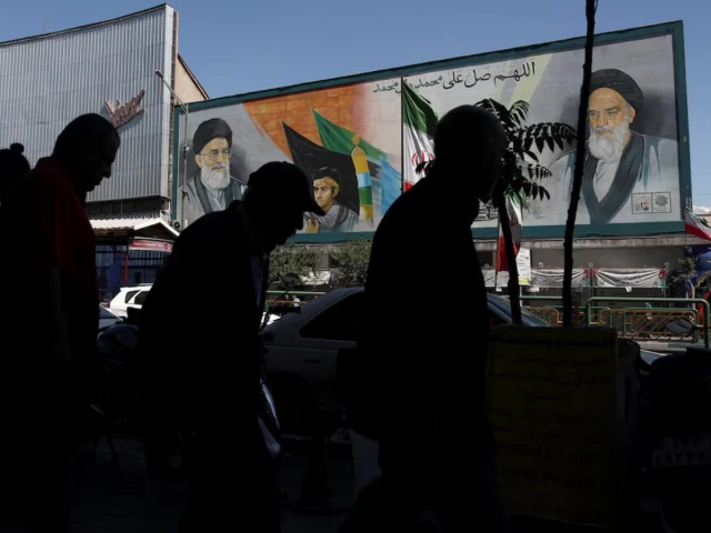people walk past a mural depicting the late leader of the islamic revolution ayatollah ruhollah khomeini and iran s late supreme leader ayatollah ali khamenei in tehran iran photo reuters people walk past a mural depicting the late leader of the islamic revolution ayatollah ruhollah khomeini and iran s late supreme leader ayatollah ali khamenei in tehran iran photo reuters