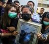 family members react as they receive the body of a victim at the police hospital morgue following a deadly fire at a pub in bangkok thailand photo reuters