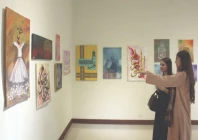 visitors view selected works at the noor e qalam calligraphy students exhibition at the national art gallery islamabad held under the auspices of the pakistan national council of the arts pnca the exhibition showcases quranic verses and the beautifully rendered names of allah created by students who completed a six month calligraphy course photo raja zafar express
