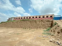safety hazard excavation around the boundary wall of a government school in taxila s dhoke syedan leaves students and teachers exposed to serious safety risks raising concerns over potential accidents and disruption to access photos express