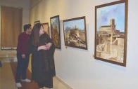 visitors explore the artist s creativity in representing local folklore through intriguing colourful artworks on display at the punjab arts council in rawalpindi photo online