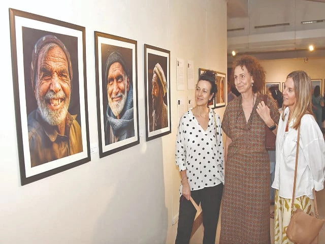 visitors engage with powerful visual narratives by amir khan luke myers anita schneider and shahzad ahmad at the perspectives on pakistan photography exhibition held at the pakistan national council of the arts pnca islamabad photo express visitors engage with powerful visual narratives by amir khan luke myers anita schneider and shahzad ahmad at the perspectives on pakistan photography exhibition held at the pakistan national council of the arts pnca islamabad photo express