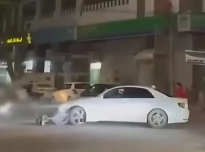 watch reckless driver hits two bikers while doing donuts on tariq road watch reckless driver hits two bikers while doing donuts on tariq road