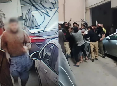 watch enraged mob beats robber in karachi s gulistan e johar watch enraged mob beats robber in karachi s gulistan e johar