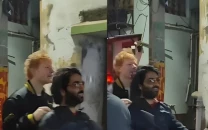 watch ed sheeran s scooter ride with arijit singh