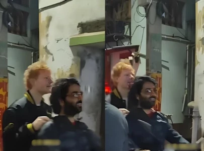 watch ed sheeran s scooter ride with arijit singh watch ed sheeran s scooter ride with arijit singh