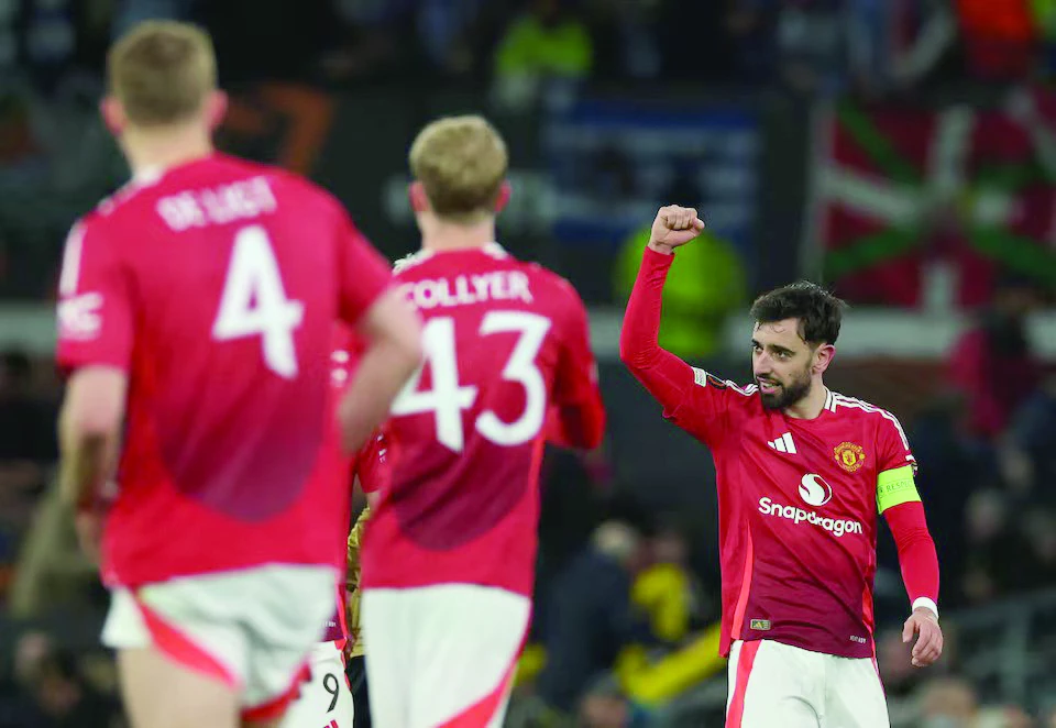 manchester united s bruno fernandes celebrates scoring their second goal with teammates during the europa league round of 16 second leg against real sociedad at old trafford manchester on march 13 photo reuters manchester united s bruno fernandes celebrates scoring their second goal with teammates during the europa league round of 16 second leg against real sociedad at old trafford manchester on march 13 photo reuters