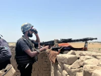 security personnel man a post in a kacha area photo express
