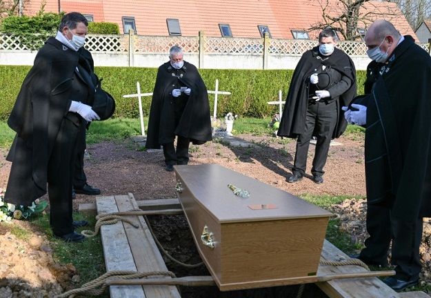 Founded in 1188, the Charitables have for eight centuries taken care of funerals for the inhabitants of Bethune regardless of religion or wealth. PHOTO: AFP