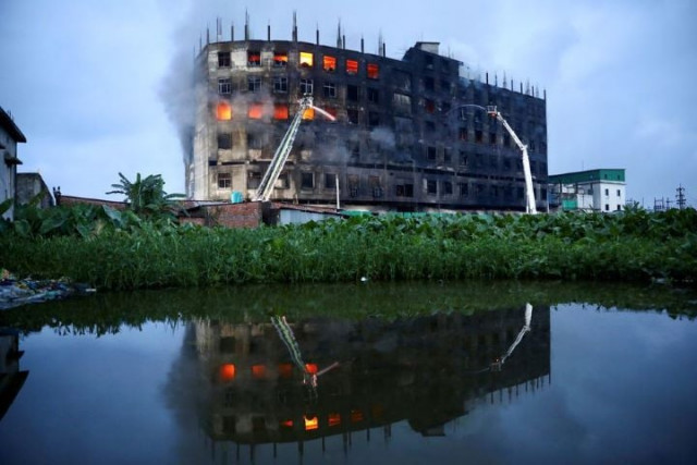 flames rise the morning after a fire broke out at a factory named hashem foods ltd in rupganj of narayanganj district on the outskirts of dhaka bangladesh july 9 2021 reuters mohammad ponir hossain flames rise the morning after a fire broke out at a factory named hashem foods ltd in rupganj of narayanganj district on the outskirts of dhaka bangladesh july 9 2021 reuters mohammad ponir hossain