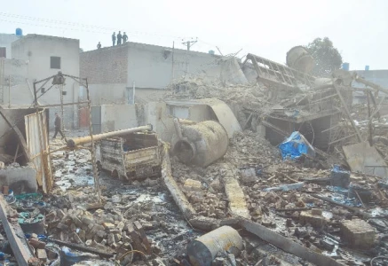 twisted metal shattered brick and scorched debris mark the ruins of a chemical factory in faisalabad s malikpur photo online twisted metal shattered brick and scorched debris mark the ruins of a chemical factory in faisalabad s malikpur photo online
