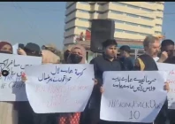 families of pakistani crew members abducted by somali pirates protest at native jetty bridge in karachi on wednesday screengrab