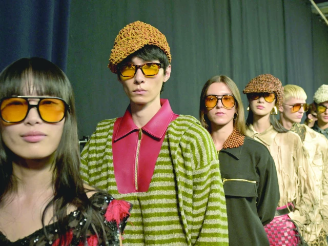 models stand in line backstage during a rehearsal of the tokyo james collection show at milan s fashion week on sunday photo afp