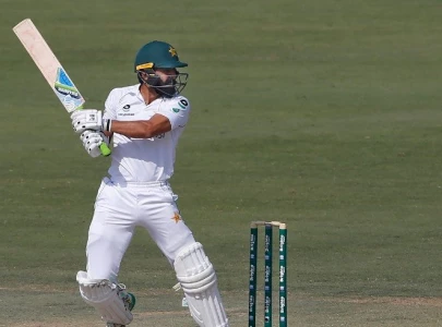 fawad century highlights day two as pakistan dominate