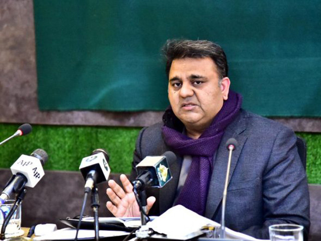 federal minister for information and broadcasting chaudhry fawad hussain addressing a press conference in islamabad on december 14 photo app