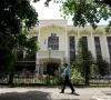 a policeman walks past the federal board of revenue fbr office building in islamabad on august 29 2018 photo reuters a policeman walks past the federal board of revenue fbr office building in islamabad on august 29 2018 photo reuters