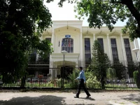 a policeman walks past the federal board of revenue fbr office building in islamabad on august 29 2018 photo reuters
