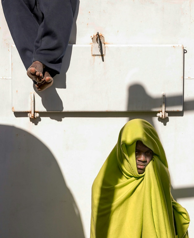 A picture released by German migrant rescue NGO Sea-Eye shows an operation to rescue people in distress off the Libyan coast in April. PHOTO: AFP