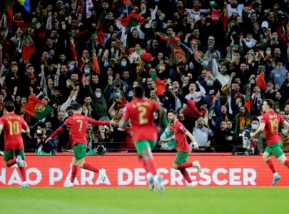 portugal and poland grab world cup finals spots