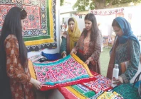 women explore and purchase traditional sindhi items from cultural stalls at the 8th sindh literature festival which also features literature sessions live music and awards honoring youth achievers photo jalal qureshi express women explore and purchase traditional sindhi items from cultural stalls at the 8th sindh literature festival which also features literature sessions live music and awards honoring youth achievers photo jalal qureshi express