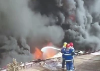 hazardous job firefighters try to douse a fire at a detergent factory in karachi s site area on tuesday photo nni