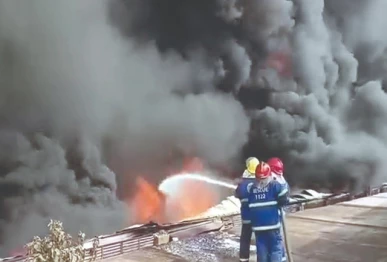 hazardous job firefighters try to douse a fire at a detergent factory in karachi s site area on tuesday photo nni