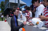 usmnt midfielder brenden aaronson signs autographs during a community team training session in preparation for the 2026 fifa world cup at great park championship soccer stadium reuters