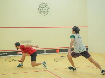 nasir fights back to win squash title nasir fights back to win squash title
