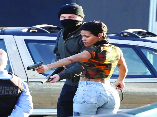 leonardo di caprio stars alongside teyana taylor in the film photo file leonardo di caprio stars alongside teyana taylor in the film photo file
