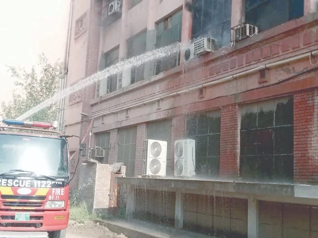 firefighters extinguish a blaze that broke out in nishtar hospital in multan it was suspected that an electric short circuit had caused the fire photo ppi