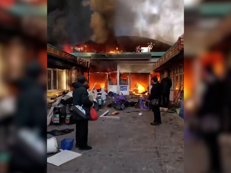 smoke rises from a fire at a vegetable market in zhangjiakou hebei china january 4 2025 in this screen grab obtained from a social media video photo reuters