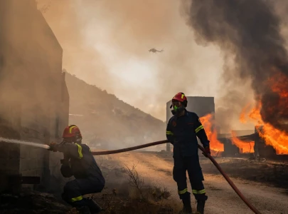 two dead hundreds evacuated from fires on island near athens two dead hundreds evacuated from fires on island near athens