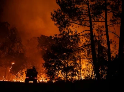 tens of thousands flee fires in france tens of thousands flee fires in france