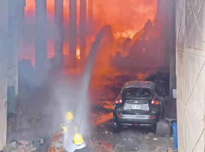 fire brings down factory fire brings down factory