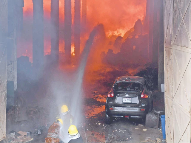 firefighters struggle to control the fire at a garment factory in new karachi industrial area on tuesday photo onlin