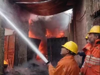 firefighters at work quelling the landhi fire january 26 karachi photo the express tribune