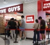 people queue at a five guys fast food restaurant after the us burger chain opened its first two locations earlier this month in beijing china august 15 2026 photo reuters