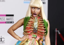 nicki minaj reveals title of intro track and release date for upcoming album with cryptic ai imagery nicki minaj reveals title of intro track and release date for upcoming album with cryptic ai imagery